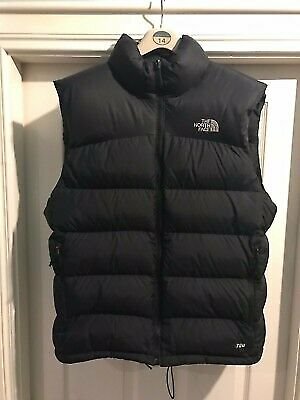 grey north face body warmer